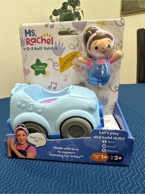 Rachel 1-2-3 Roll! Pull-Back Toy Vehicle in Light Blue with Figure